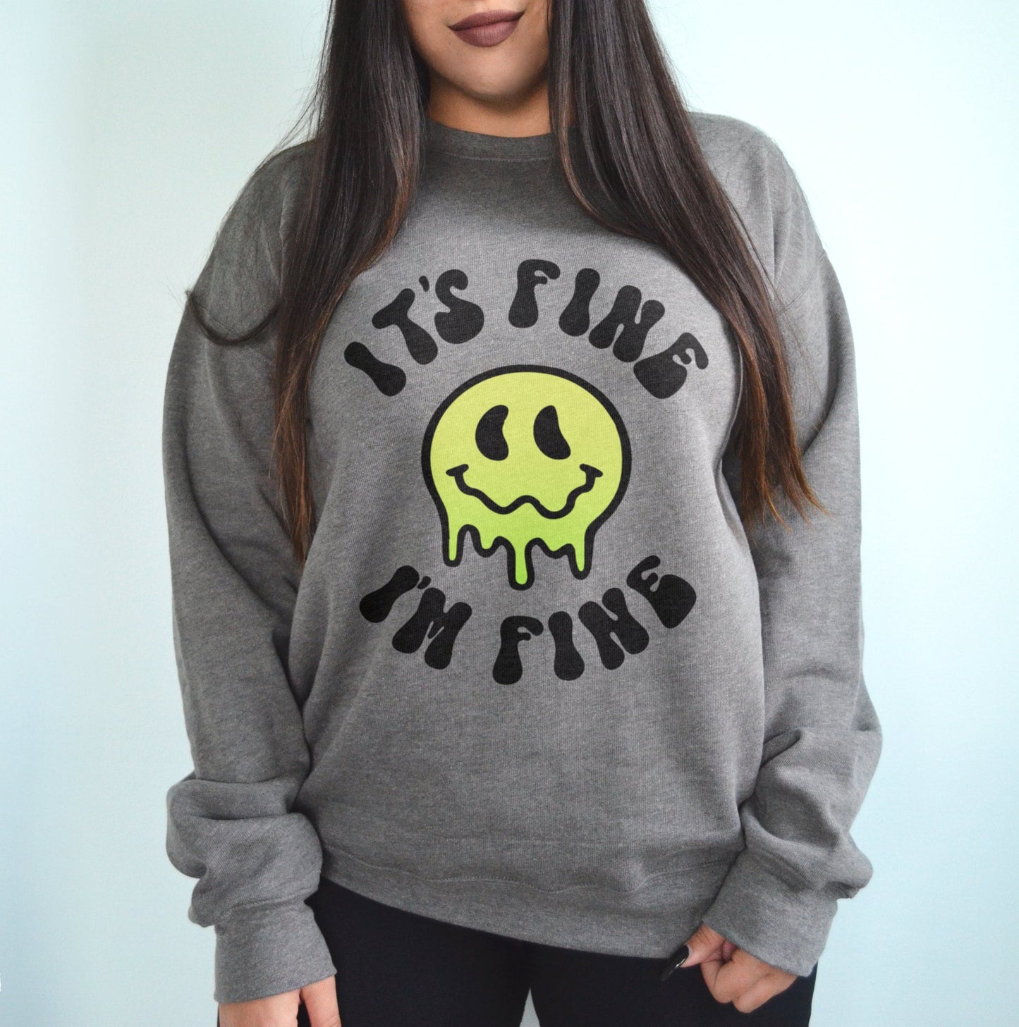 melting smiley sweatshirt